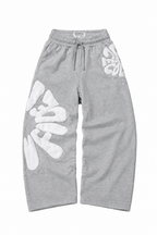 CAPTURE™— OVERSIZED TRACK PANTS
