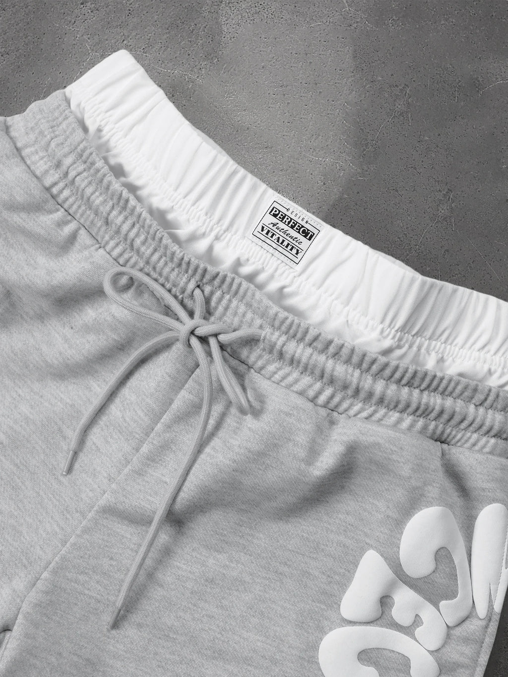 CAPTURE™— OVERSIZED TRACK PANTS