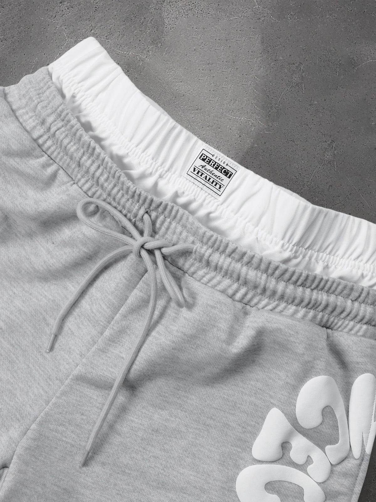 CAPTURE™— OVERSIZED TRACK PANTS