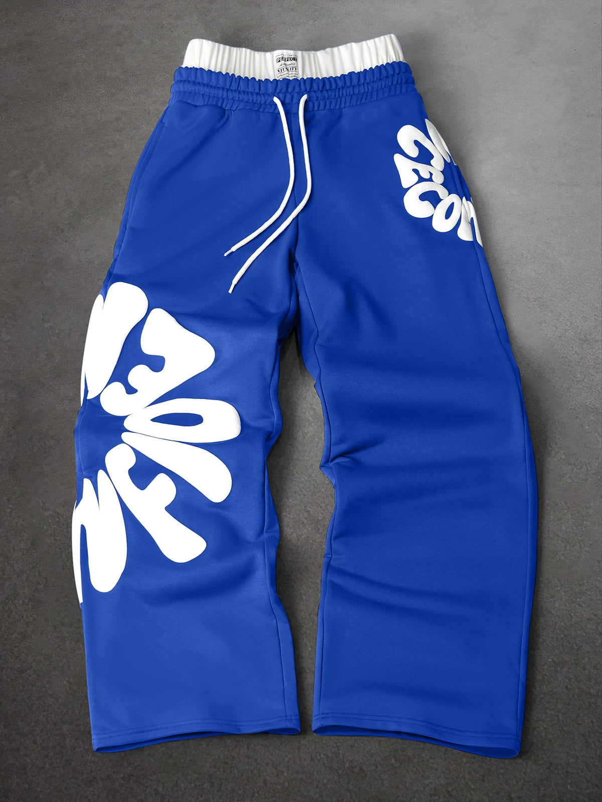 CAPTURE™— OVERSIZED TRACK PANTS