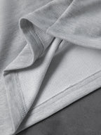 CAPTURE™— OVERSIZED TRACK PANTS