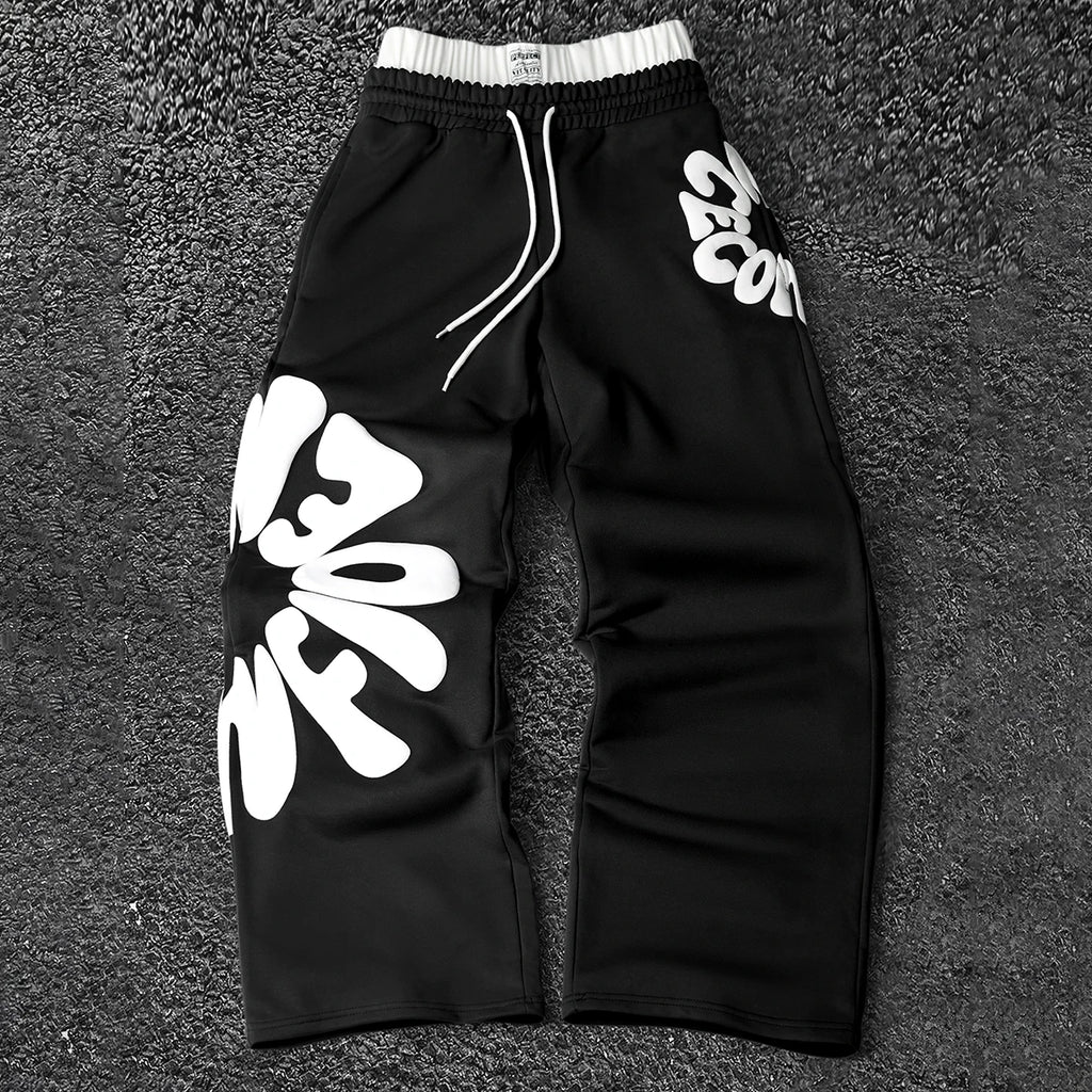 CAPTURE™— OVERSIZED TRACK PANTS