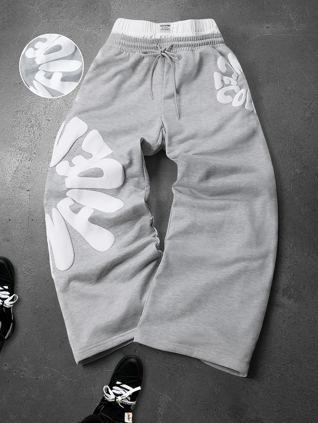 CAPTURE™— OVERSIZED TRACK PANTS