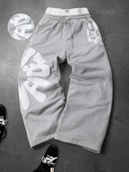 CAPTURE™— OVERSIZED TRACK PANTS