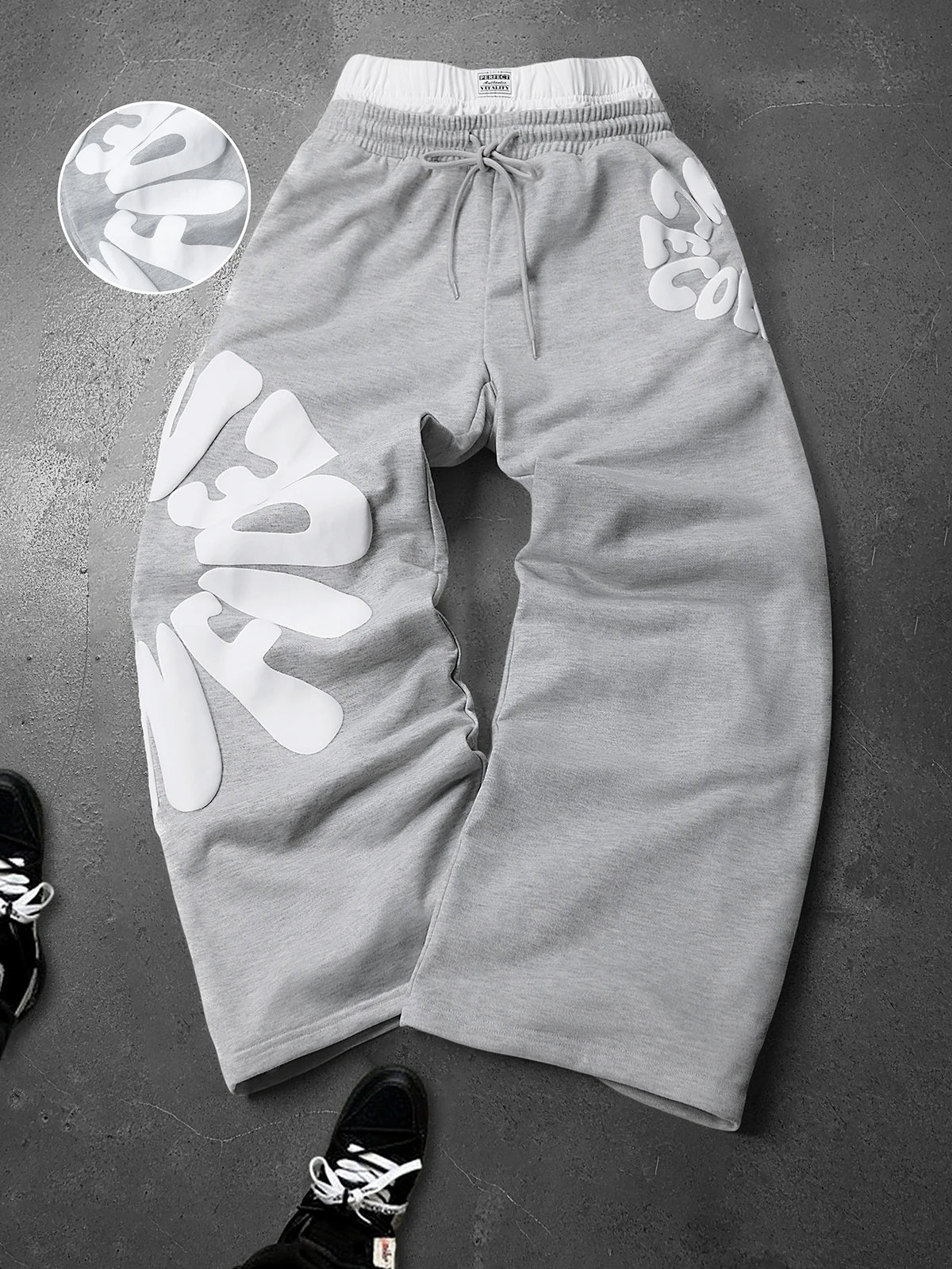 CAPTURE™— OVERSIZED TRACK PANTS