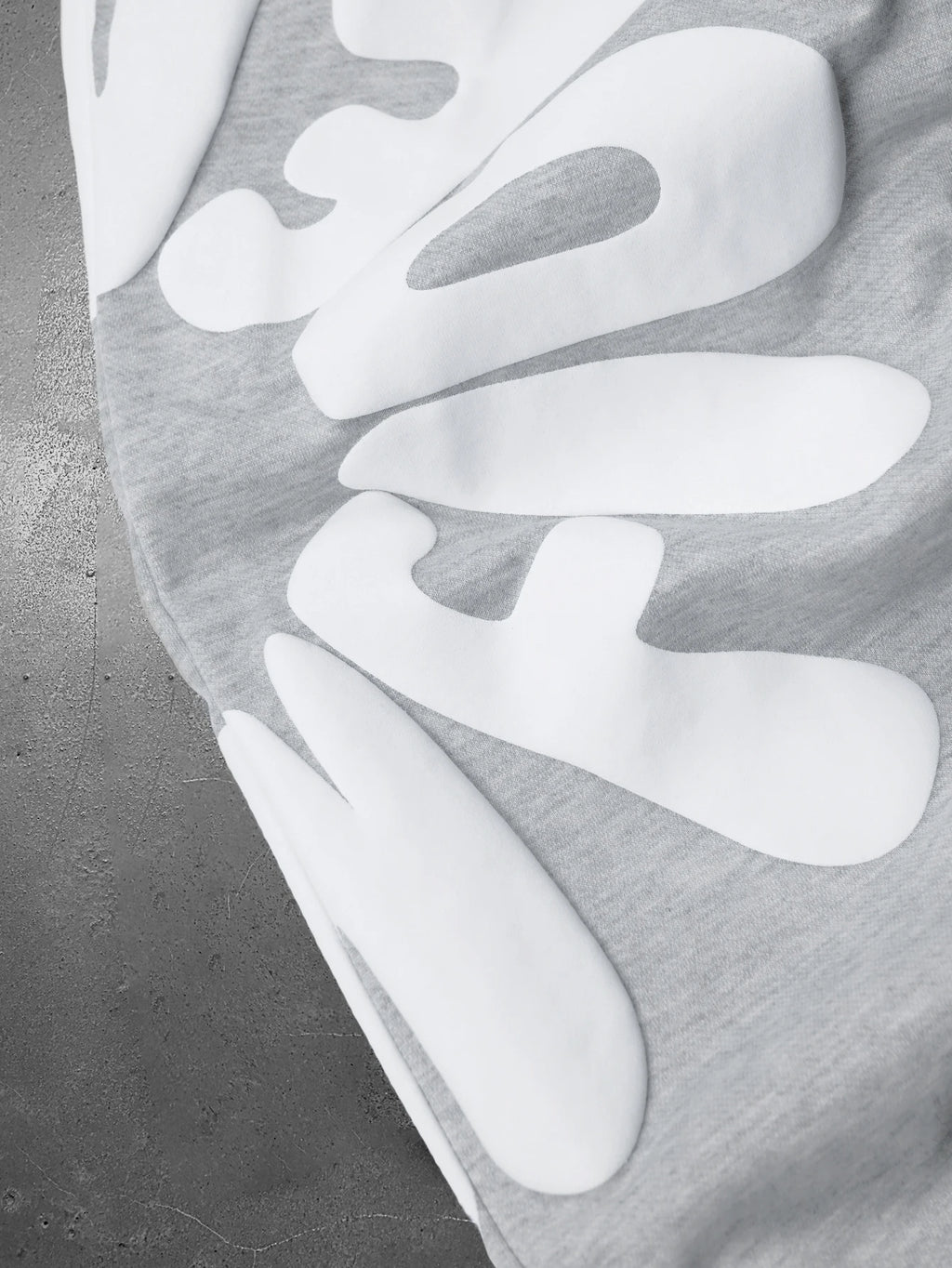 CAPTURE™— OVERSIZED TRACK PANTS