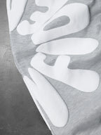 CAPTURE™— OVERSIZED TRACK PANTS