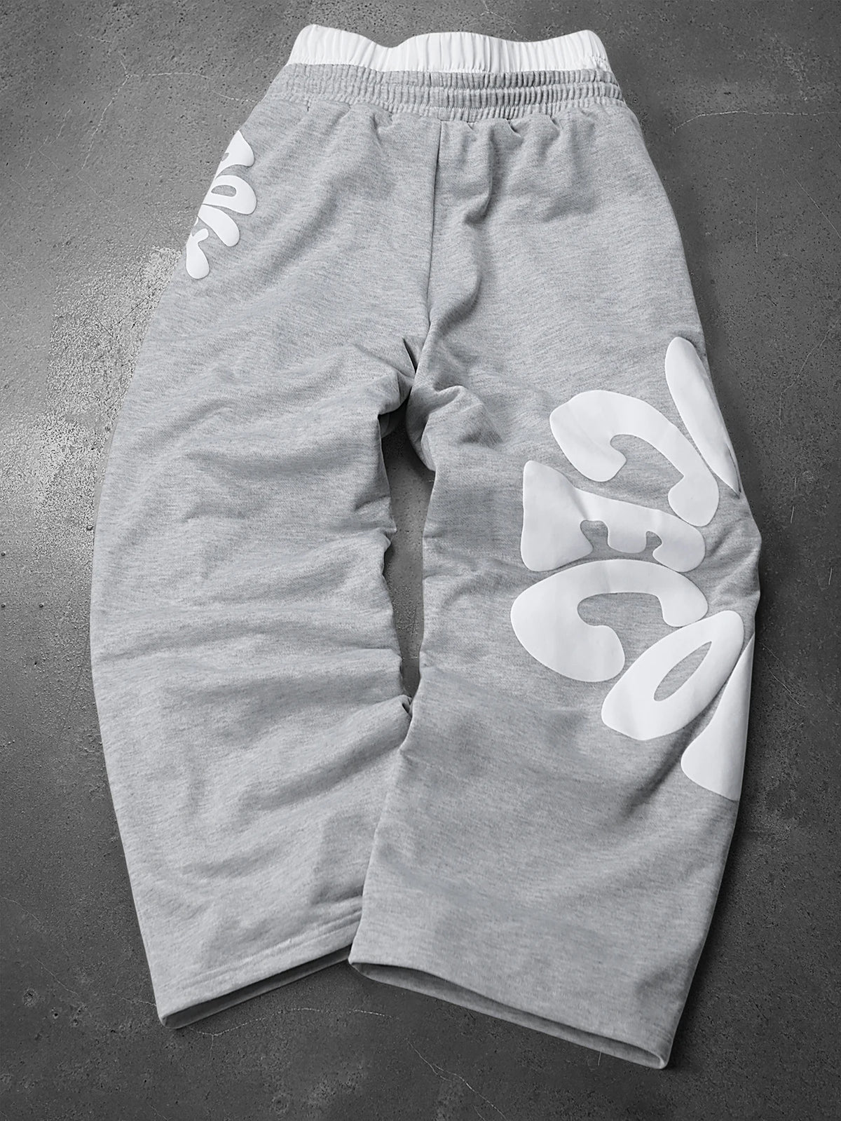 CAPTURE™— OVERSIZED TRACK PANTS