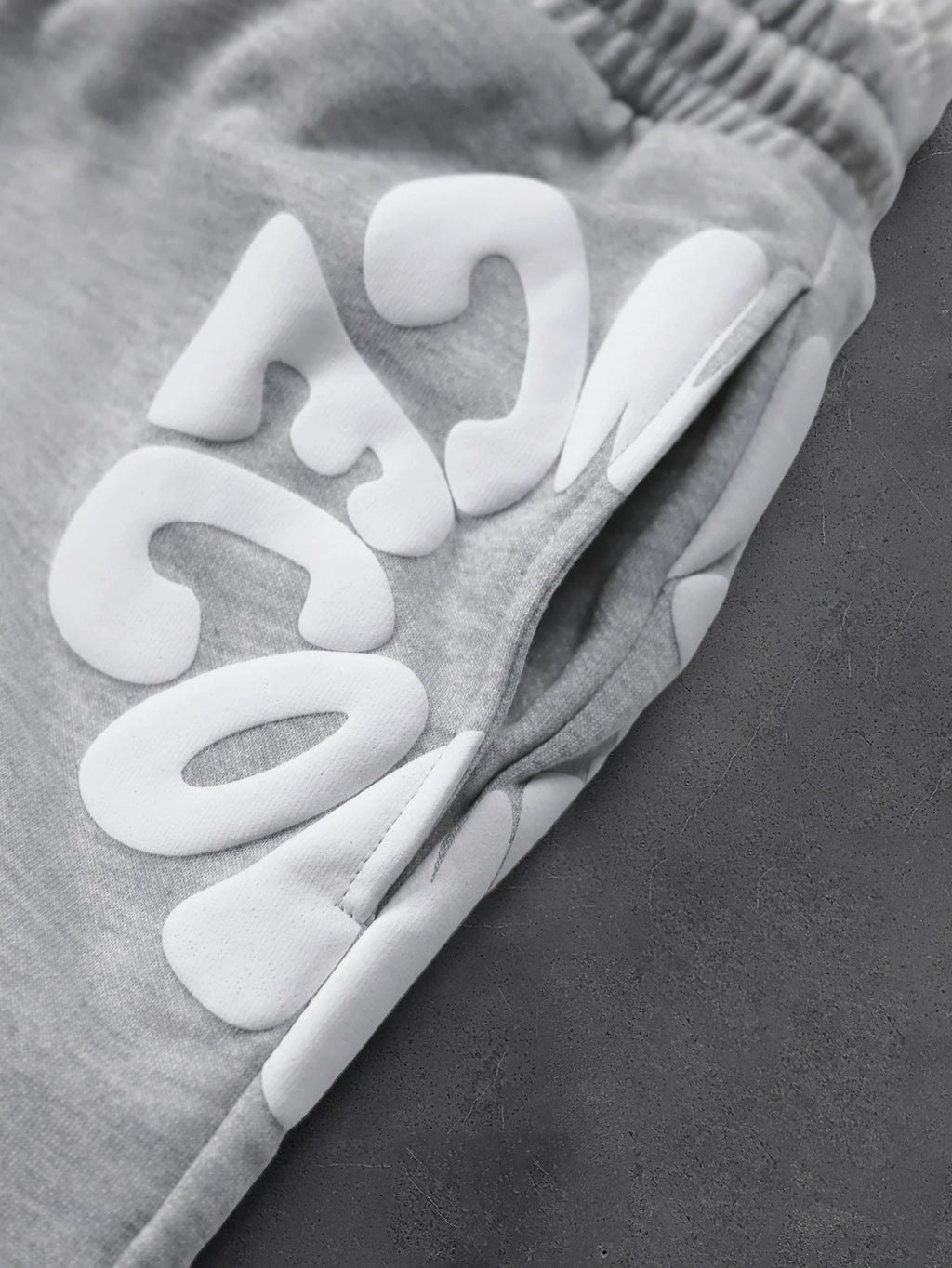 CAPTURE™— OVERSIZED TRACK PANTS