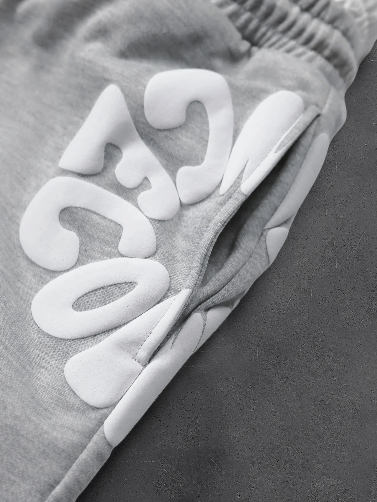 CAPTURE™— OVERSIZED TRACK PANTS