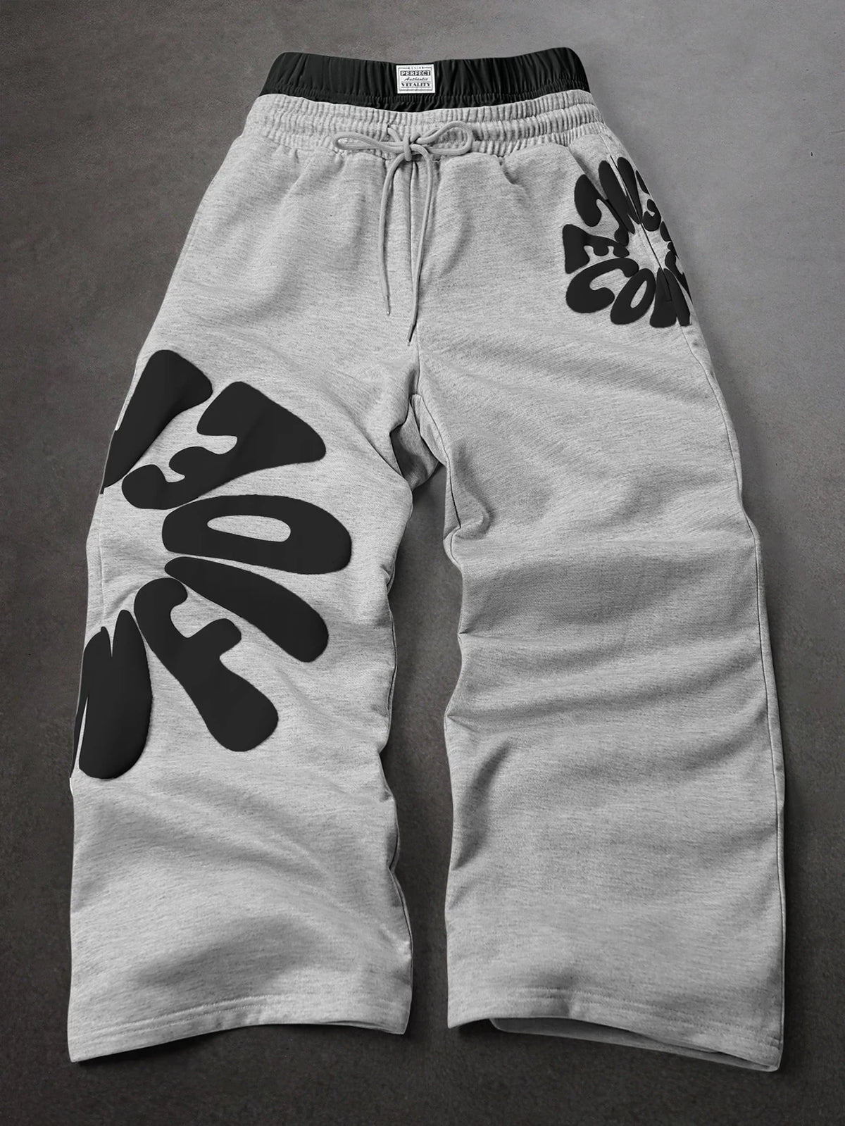 CAPTURE™— OVERSIZED TRACK PANTS