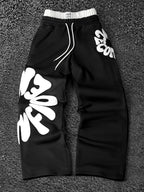 CAPTURE™— OVERSIZED TRACK PANTS